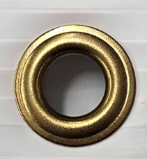 Example of a metal grommet used for hanging a sign